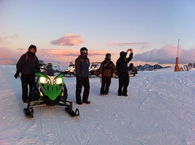 Snowmobiles at dusk 